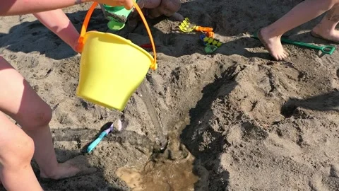 Summer Building Tools on beach kids play Stock Footage 156854752