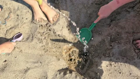 Summer Building Tools on beach. play with water and sand Stock Footage 156854786