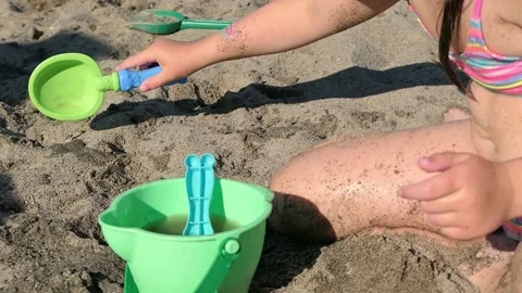 Summer Building Tools on beach. play with water and sand Stock Footage 156854838