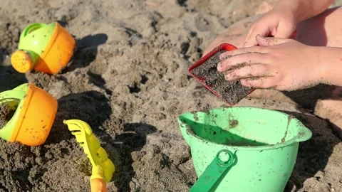 Summer Building Tools on beach. play with water and sand Stock Footage 156854878
