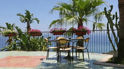 Summer Cafe and a lonely table close to the railing Stock Footage 242300828