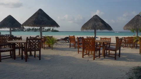 Summer cafe on the beach with white sand overlooking the sea. Stock Footage 90749140