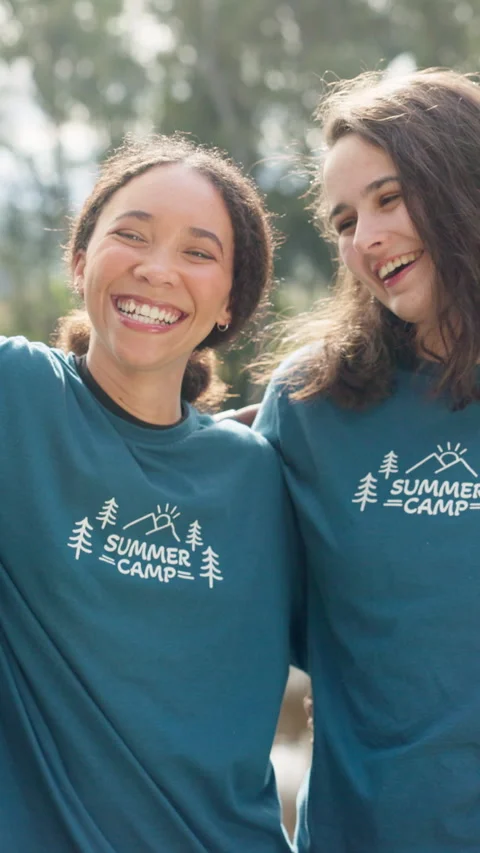 Summer camp, volunteer and face of people in nature with confidence, support and Stock Footage 333442500