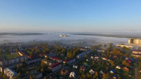 Summer cityscape in mist aerial view Stock Footage 80457795