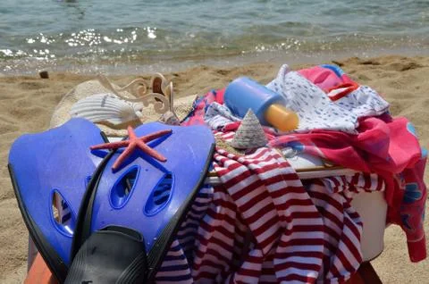 Summer Clothes on Beach Stock Photos