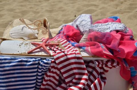 Summer Clothes on Beach Stock Photos