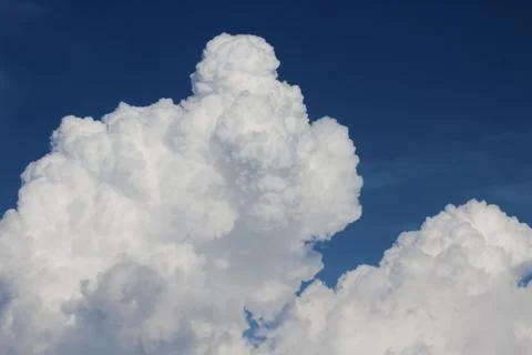 Summer cloud in blue sky Stock Photos