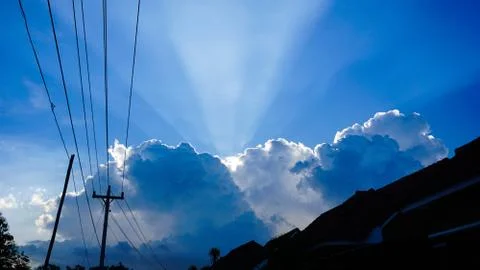 Summer clouds cover the sun Stock Photos