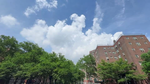 Summer clouds float over the Affordable housing at Lower East Side Manhattan. Video stock 314070672