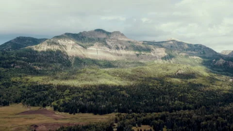 Summer Clouds moving over mountains in Colorado Stock Footage 154808549