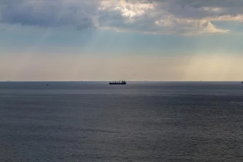 Summer cloudy sky over the sea Stock Photos