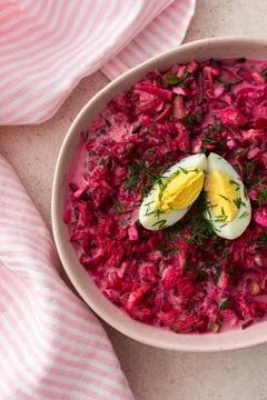 Summer cold beetroot soup made from beets, radishes, cucumbers, potatoes and  Foto stock