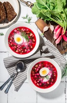 Summer cold beetroot soup with sour cream and egg Stock Photos
