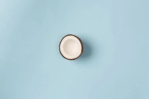 Summer composition. Coconut on blue background. Summer concept. Flat lay, top Stock Photos
