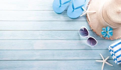 Summer composition concept made from starfish, beach hat, flip flop, .sunglas Stock Photos