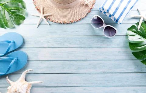 Summer composition concept made from starfish, beach hat, flip flop, airplane Stock Photos