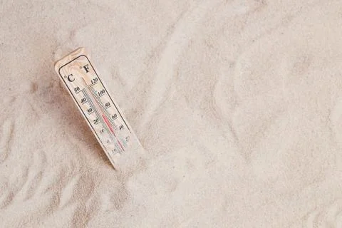 Summer composition with sand thermometer Stock Photos