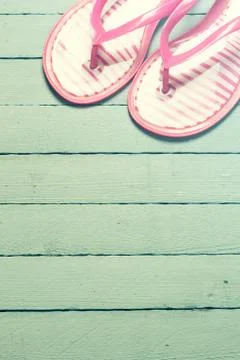 Summer concept with sandy beach, shells and cord. Stock Photos