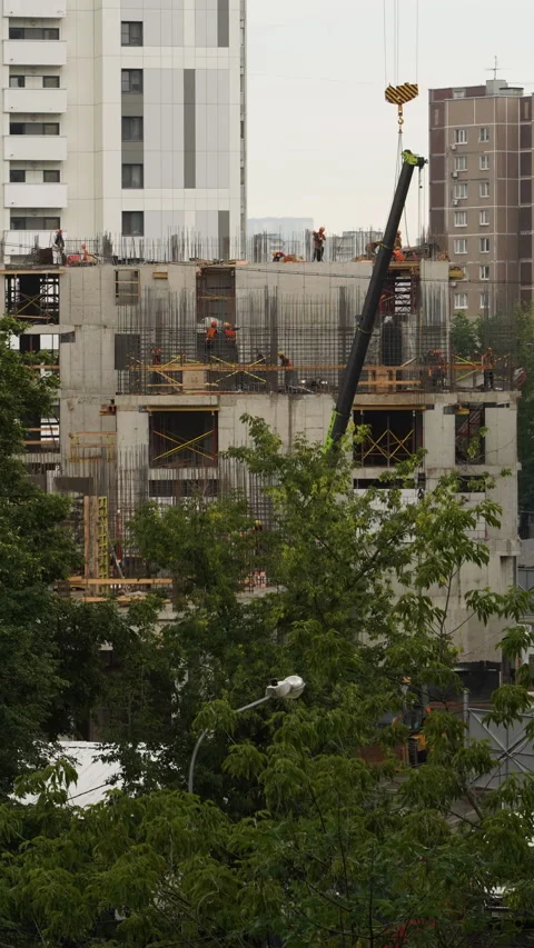 Summer construction timelapse with workers moving on concrete floors. Stock Footage 329936601