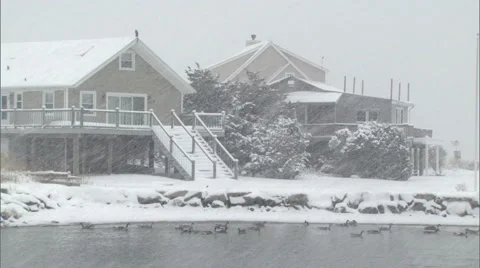 Summer cottages in winter snowfall 動画素材 47678397