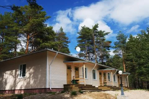 Summer cozy cottage Stock Photos