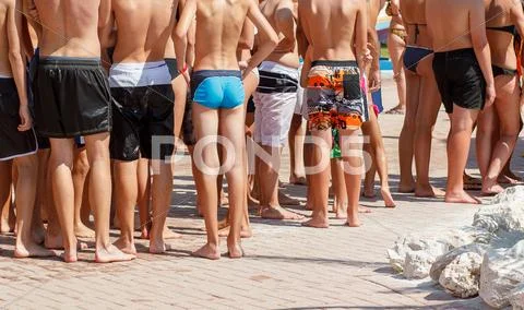 Summer crowd of young waiting peoples Stock Photos