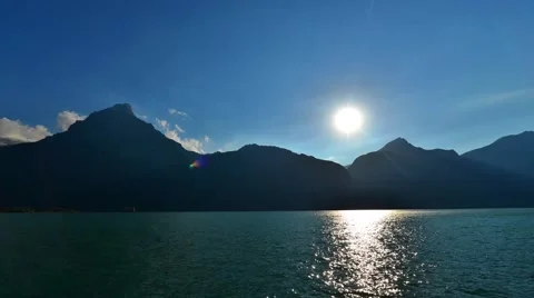 Summer day on a background of mountains in the lake. Stock Footage 65210364