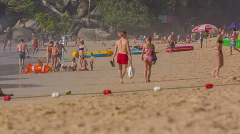 Summer day beach walking crowded panorama hd phuket thailand Stock Footage 64565480