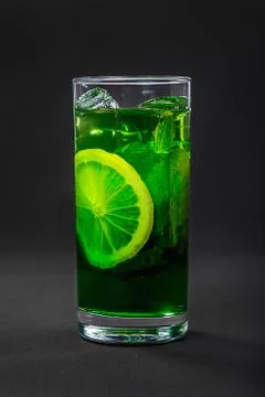 Summer drink with lime and mint isolated black Stock Photos