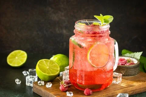 Summer drinks, bar soft beverage. Refreshing glasses drink raspberry with min Stock Photos