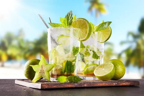 Summer drinks with blur beach on background Stock Photos