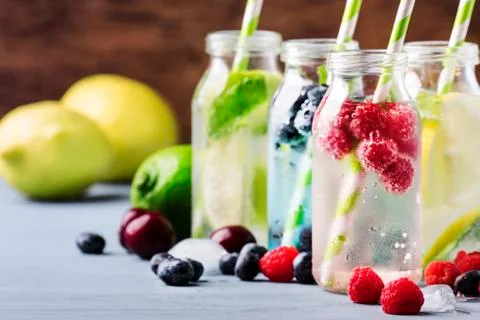 Summer drinks set. Berry, fruit and citrus non-alcoholic refreshing ice cold Stock Photos