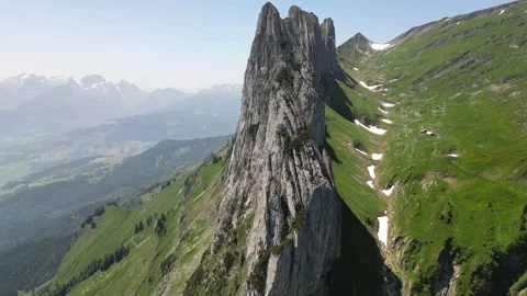 Summer Drone Flyover of Alpine Rock Spire Saxer Lucke Stock Footage 323331092