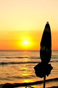 Summer is ending, sunset at beach, vertical Stock Photos