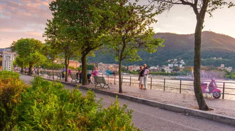 Summer evening sunset como lake bay traffic street panorama 4k time lapse italy Stock Footage 68889217