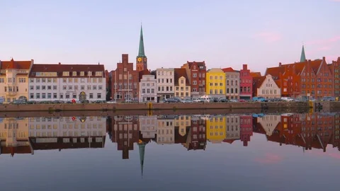 Summer evening view of the Old Town pier and boat in Lubeck, Germany Stock Footage 78057478