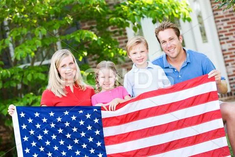 Summer: family with american flag Stock Photos
