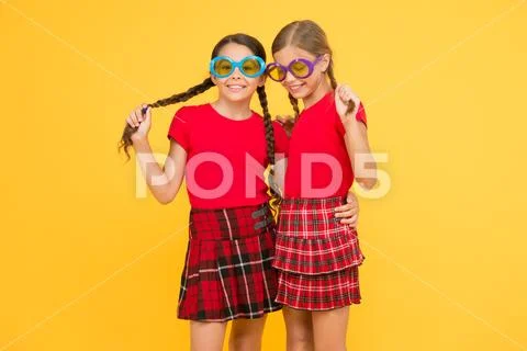 Summer fashion trend. Summer fun. Summer accessory. Girls cute sisters similar Stock Photos