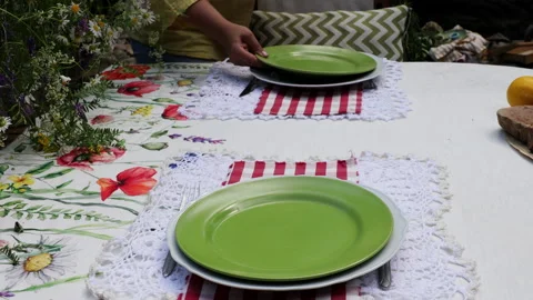 Summer festive table setting in the garden with wildflowers and watermelon Stock-Footage 278602571
