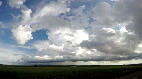 Summer field. Clouds before a thunderstorm. Time lapse of the sky with clouds. Stock Footage 132410186