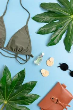 Summer flat lay on blue background. Stock Photos