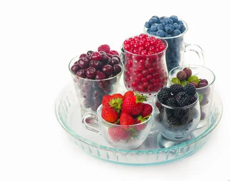 Summer fresh berries of different types on a white background Stock Photos