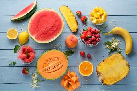 Summer Fruit on blue table background Stock Photos