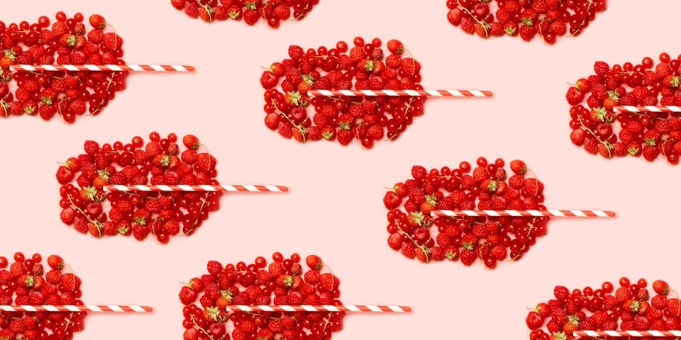 Summer fruit concept pattern. Red ripe berries in the shape of a glass with f Stock Photos