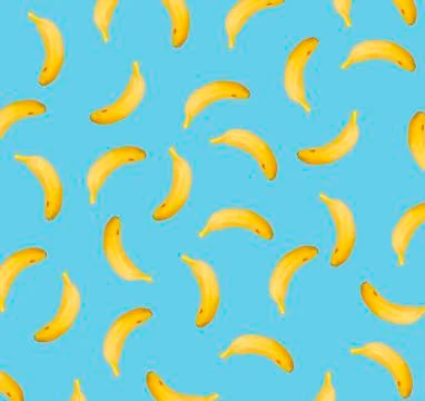 Summer fruit pattern. Bananas pattern on blue background. Stock Photos