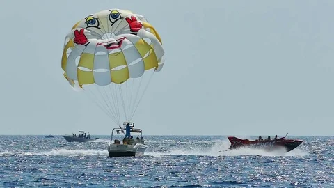 Summer Fun at the Sea - Parachuting Stock Footage 80476139