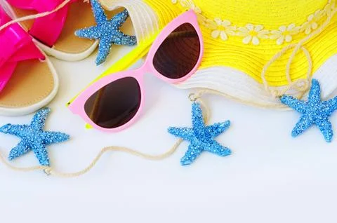 Summer fun time and accessories on blue wooden background. Mock up Stock Photos