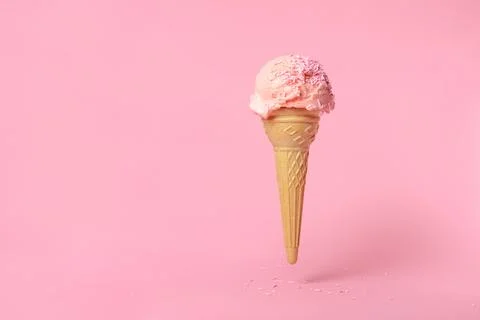 Summer funny creative concept of flying wafer cone scoops of ice cream deco.. Stock Photos