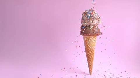 Summer funny creative concept of standing wafer cone with chocolate and cho.. Stock Footage 331228914
