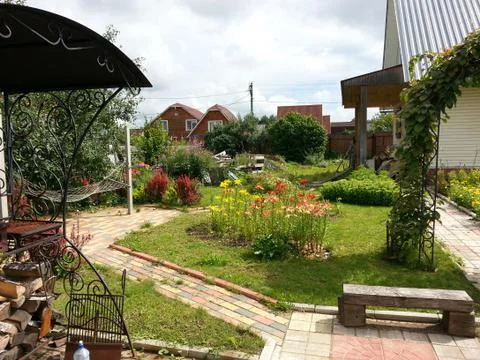 Summer garden with paths Stock Photos